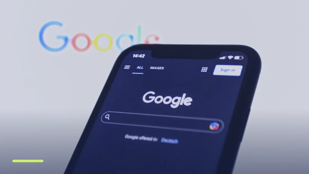 Smartphone showing the Google search page, where paid ads compete for the top positions